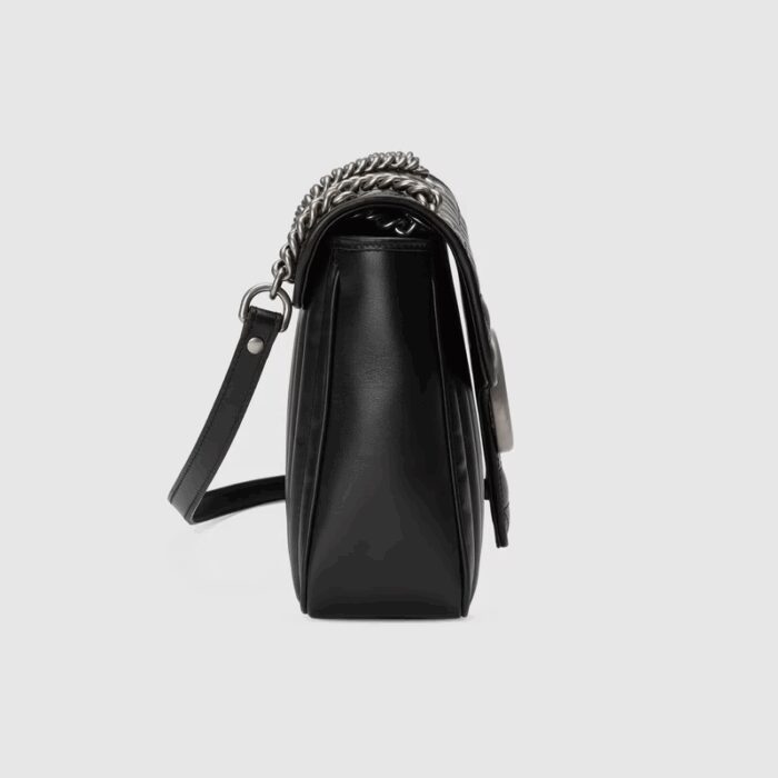 the shoulder bag is reimagined with a new geometric take on its signature finish that combines vertical and diagonal motifs.