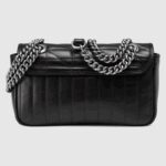 the mini shoulder bag is reimagined with a new geometric take on its signature finish that combines vertical and diagonal motifs.
