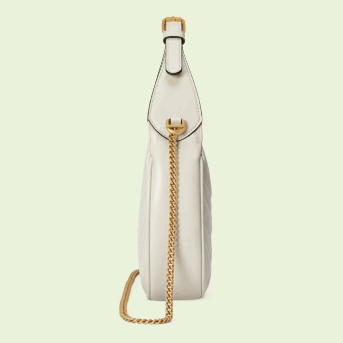 sans-serif; font-size: 12px; vertical-align: baseline; color: #4b4b4b; background-color: #ffffff;">With a crescent silhouette and textured white leather