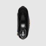 the GG Marmont collection is revered for its signature quilted leather and interwoven double G hardware. Introducing this stunning black mini bag.