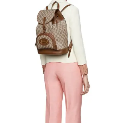 designed with impeccable craftsmanship and attention to detail. This backpack draws inspiration from the iconic Gucci 1955 Horsebit line