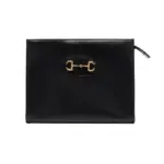 Introducing the stunning Gucci 1955 Horsebit-Embellished Leather Pouch 621890 in a perfect size of 10.2 W x 7.9 L x 2.8 D. There’s no need to compromise on style when you have this fabulous pouch by your side. It can be used as a makeup bag or a chic clutch