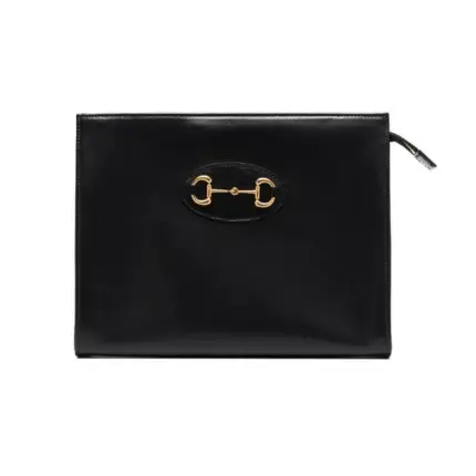 Introducing the stunning Gucci 1955 Horsebit-Embellished Leather Pouch 621890 in a perfect size of 10.2 W x 7.9 L x 2.8 D. There’s no need to compromise on style when you have this fabulous pouch by your side. It can be used as a makeup bag or a chic clutch