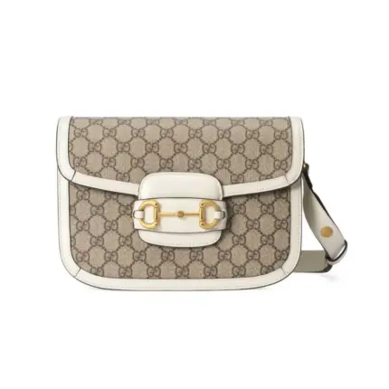 The Gucci 1955 Horsebit GG Supreme Shoulder Bag 602204 is a of an iconic design from Gucci’s archives. It features the classic lines and forms that were first introduced over sixty years ago
