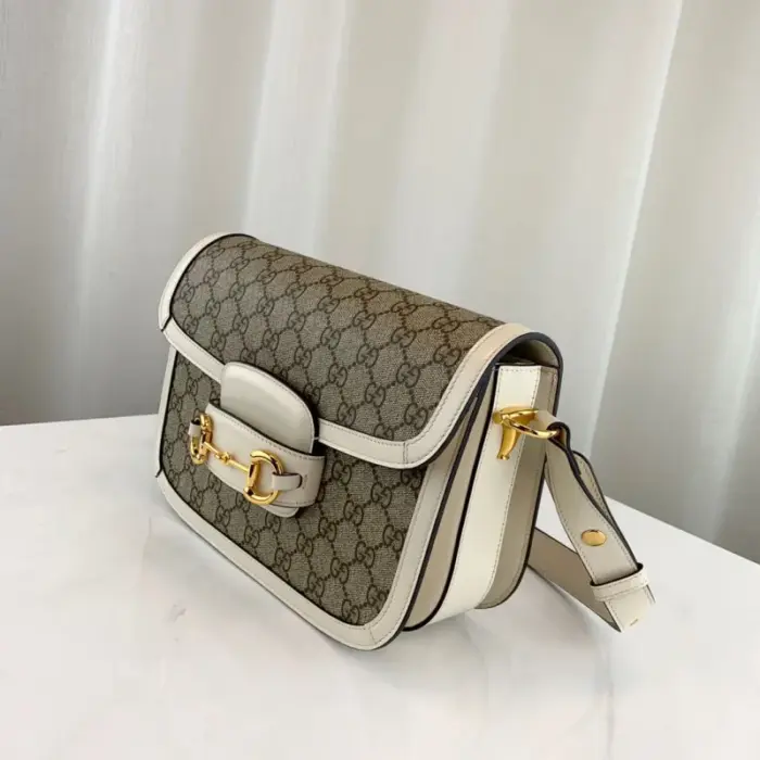 so you can wear it on one shoulder or cross-body. When the shoulder strap is lengthened