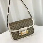 the bag comes with two additional button covers that can be used to cover the exposed studs.Other notable features of the bag include the Horsebit detail on the front