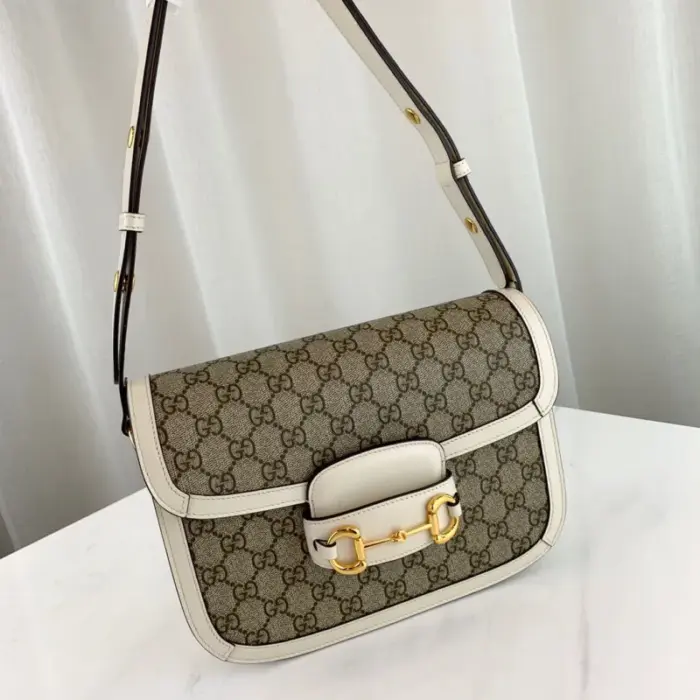 the bag comes with two additional button covers that can be used to cover the exposed studs.Other notable features of the bag include the Horsebit detail on the front
