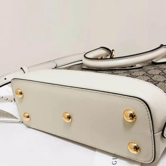 crafted over six decades ago. The modern spirit of the Gucci 1955 Horsebit top handle bag is highlighted by the iconic Horsebit detail