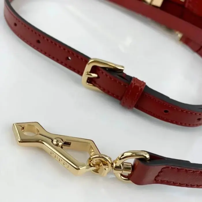 complemented by gold-toned hardware. Inside