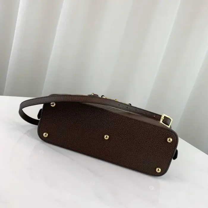 giving the bag a fresh and stylish appeal.Indulge in the allure of the Gucci 1955 Horsebit Medium Top Handle Bag 602206. Its fusion of heritage and modernity makes it a coveted accessory for those who appreciate the brand’s rich history while embracing modern fashion trends. Don’t miss your chance to own this piece that captures the essence of the original in a unique and affordable way.