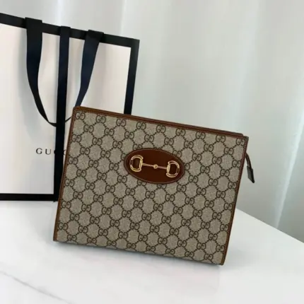 the Gucci 1955 Horsebit Pouch 621890. This stylish accessory measures 10.2 inches in width