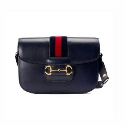 The Gucci 1955 Horsebit Shoulder Bag 602204 in Blue is a of an iconic design from Gucci’s archives. Measuring 9.8 inches in width