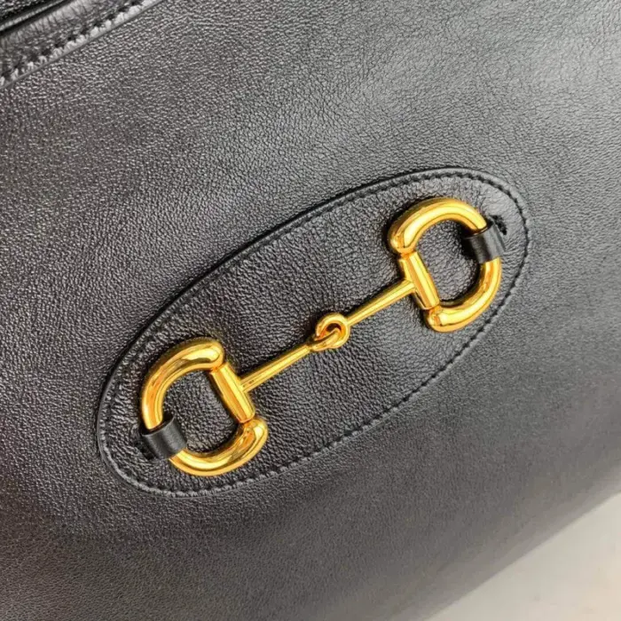 this bag exudes luxury. The rich texture and supple feel of the leather elevate its overall appeal.The bag features gold-toned hardware