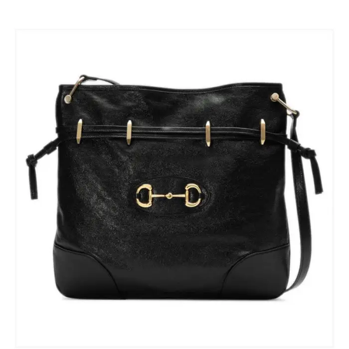 Introducing the exquisite Gucci 1955 Horsebit Tanned Leather Messenger Bag 602089. This stunning bag is crafted with meticulous attention to detail