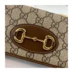this wallet features the signature double ring and bar design