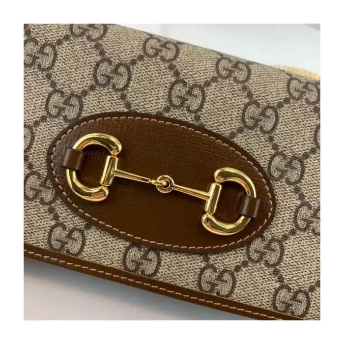 this wallet features the signature double ring and bar design