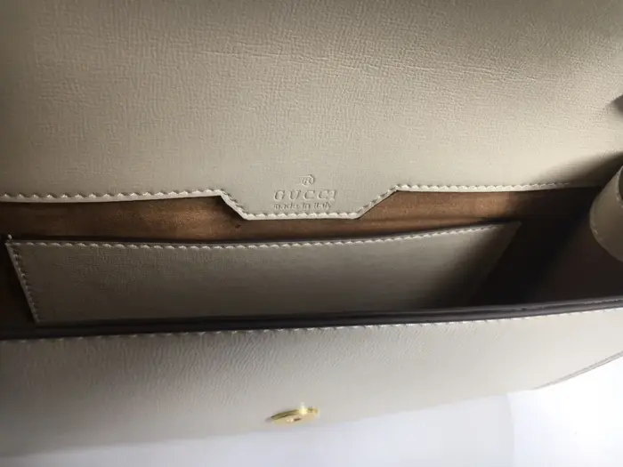 while the detachable Web shoulder strap measures 15.7 inches.With a weight of approximately 600 grams