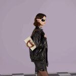 the Gucci Diana continues to combine recognizable elements of the House with the bamboo handles and Double G hardware. Crafted from white leather
