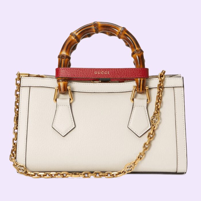 the accessory is further accentuated by two decorative leather belts