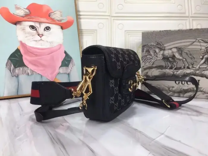 you’ll find a microfiber lining with a luxurious suede-like finish.This mini bag is designed to accommodate a cell phone measuring up to 3’W x 6.6’H x .4’D