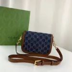 this mini bag is perfect for those looking for a compact yet stylish accessory.Designed with Gucci’s signature GG motif
