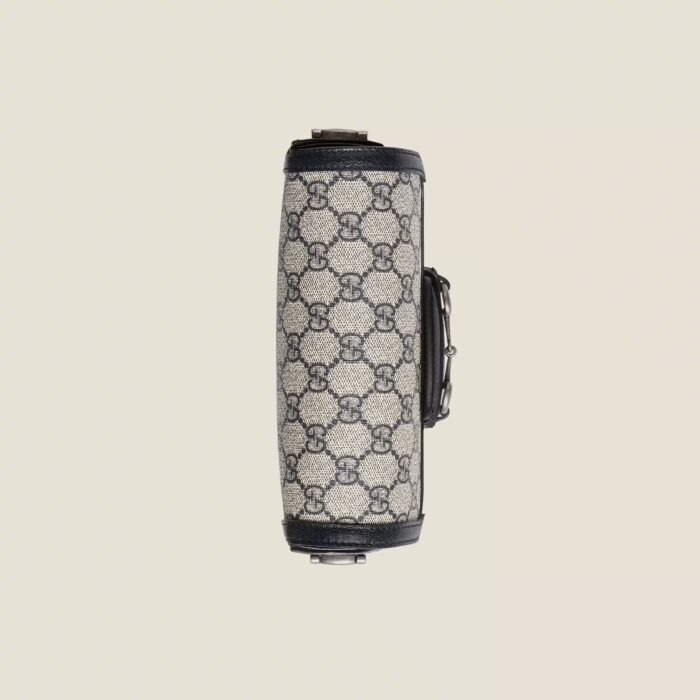 GG Supreme is introduced in a timeless mix of blue and beige for Gucci Love Parade. The canvas has come to the front of each collection decade after decade to become a hallmark of the House. Here