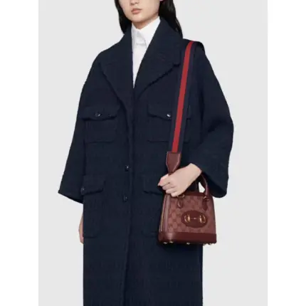 this mini bag offers a compact yet spacious design. Its standout feature is the iconic Horsebit detail