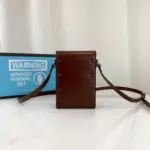 this mini bag showcases the iconic double ring and bar design