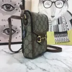 the Gucci Horsebit 1955 Mini Bag showcases the double ring and bar design. This timeless motif has become one of the House’s most recognizable symbols
