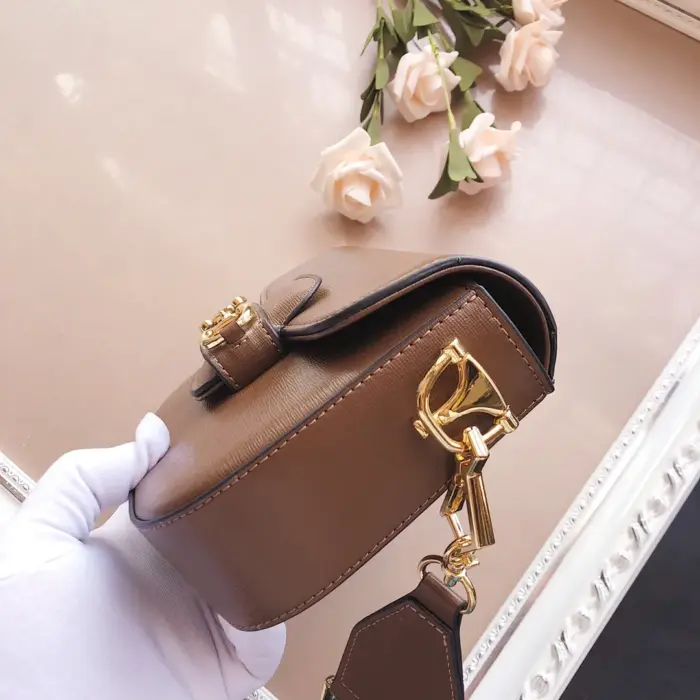 while the second is made of leather.The mini bag is compact and easy to carry