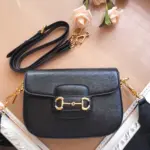 adding a touch of elegance.The interior of the bag is lined with cotton linen