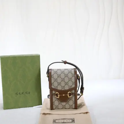 Introducing the Gucci Horsebit 1955 Mini Bag Monogram Canvas