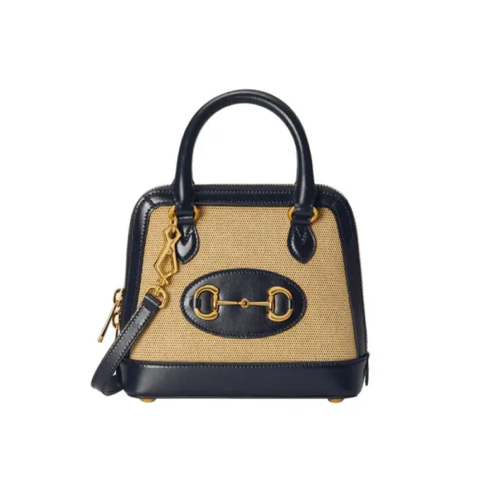 Experience the timeless elegance of the Gucci Horsebit 1955 Mini Top Handle Bag 640716 in Beige Canvas. This exquisite piece pays tribute to Gucci’s rich equestrian heritage
