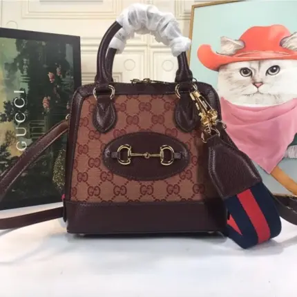 Discover the all-new Gucci Horsebit 1955 Mini Top Handle Bag 677212