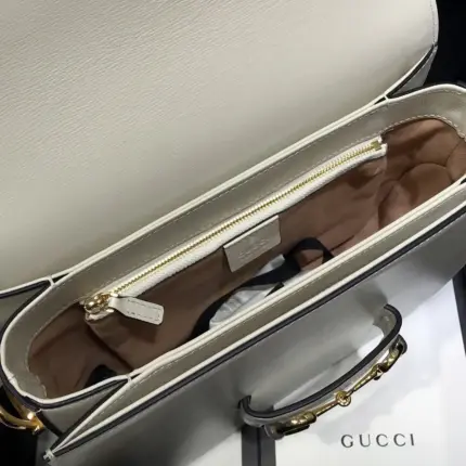 a timeless piece recreated from an archival design for Cruise 2020. This exquisite bag showcases the original details first introduced over six decades ago and combines them with a modern spirit