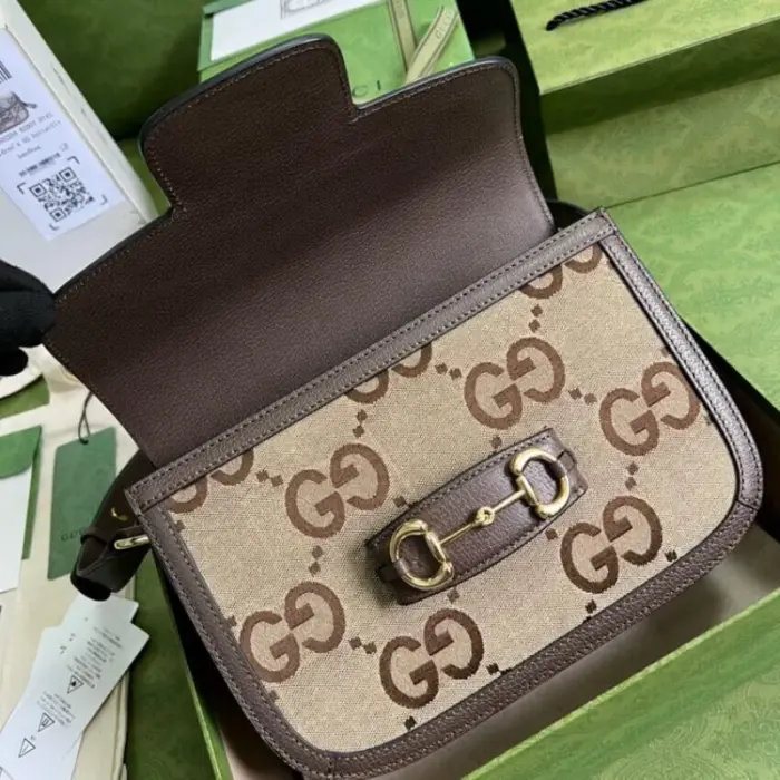 which is a symbol of Gucci’s heritage. Half horsebit details adorn each side of the bag