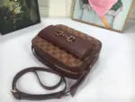 there is a front pocket for extra storage space. The bag can easily accommodate a cell phone up to 3.1??W x 6.6??H x .4??D.The shoulder strap has a 19.7″ drop
