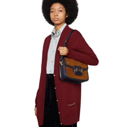 while infusing a contemporary flair with the prominent Horsebit detail.Crafted from luxurious pink corduroy with a contrasting blue leather trim and accentuated with gold-toned hardware