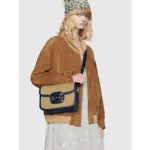 this bag showcases the iconic Horsebit detail at the front