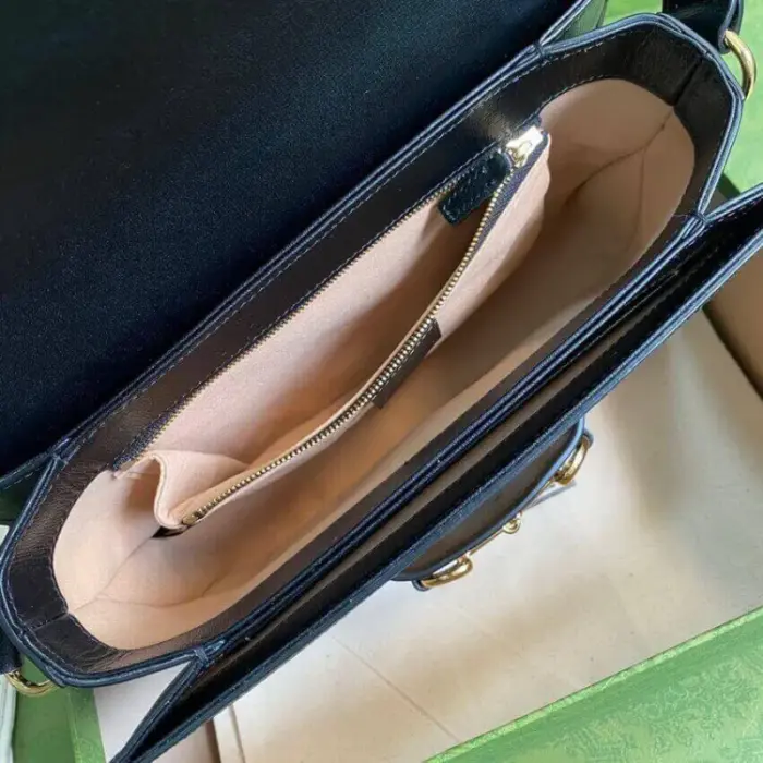 adds a touch of elegance and sophistication to the bag. It is beautifully showcased on the small flap shoulder bag