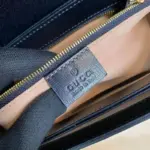 complemented by the House Web stripe on blue leather.Crafted from brick and sand-colored leather