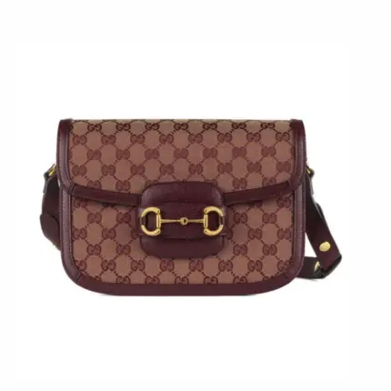 The Burgundy GG Canvas Gucci Horsebit 1955 Small Bag 602204 is a stunning recreation of a classic design. Made from beige and burgundy Original GG canvas