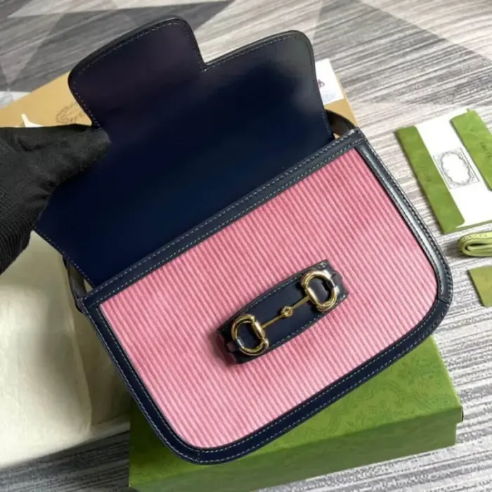 including one zipper pocket and one open pocket