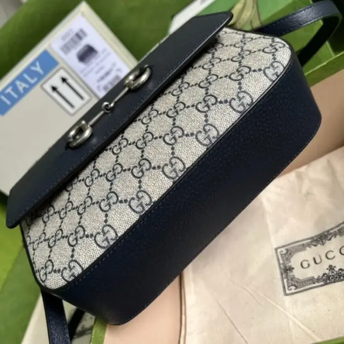 this bag is not only stylish but also sustainable. The blue leather trim adds a touch of elegance and sophistication to the overall design