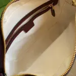 while a front pocket provides additional storage space.Practicality meets style as this bag can accommodate a cell phone measuring up to 3.1 inches in width