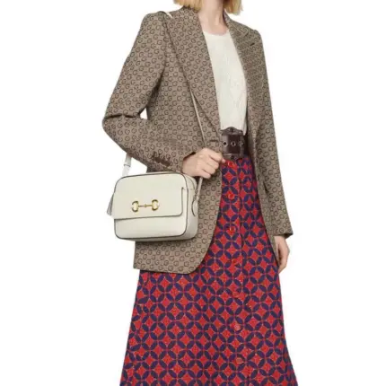 which has become synonymous with the Gucci brand. Inspired by Gucci’s equestrian roots