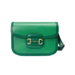 Introducing the stunning Gucci Horsebit 1955 Small Shoulder Bag 602204 in a beautiful shade of green leather. This bag measures 9.8 inches in width