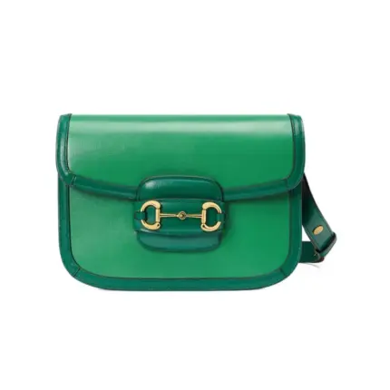 Introducing the stunning Gucci Horsebit 1955 Small Shoulder Bag 602204 in a beautiful shade of green leather. This bag measures 9.8 inches in width