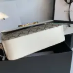 showcasing the brand’s commitment to sustainability. The addition of contrasting white leather details elevates its overall aesthetic.Enhancing its functionality