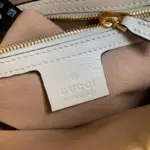 ensuring you can keep your device close at hand. The shoulder strap has a drop of 19.7″